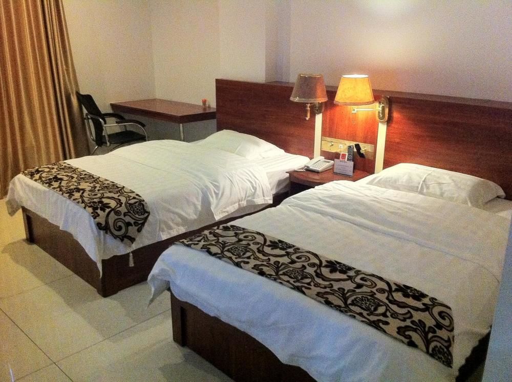 Guoxing Business Hotel Чжаоцин Екстериор снимка