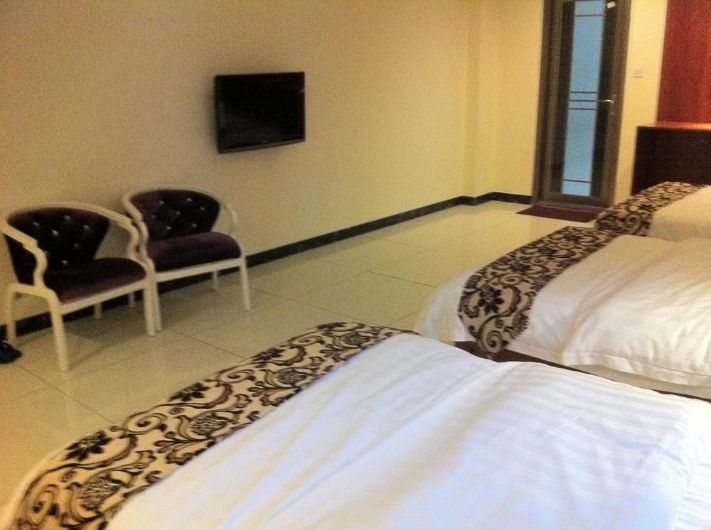 Guoxing Business Hotel Чжаоцин Екстериор снимка