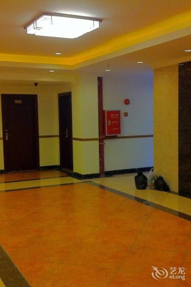Guoxing Business Hotel Чжаоцин Екстериор снимка
