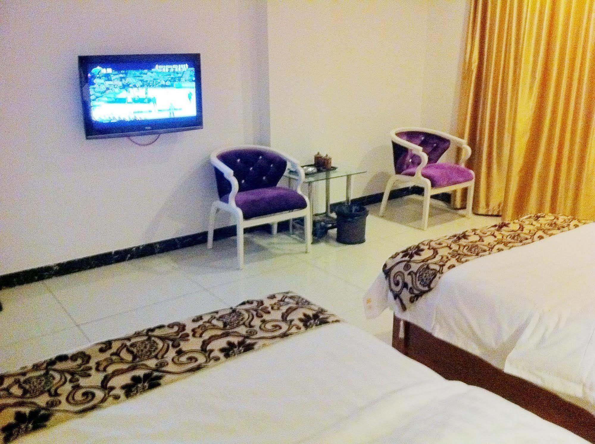Guoxing Business Hotel Чжаоцин Екстериор снимка