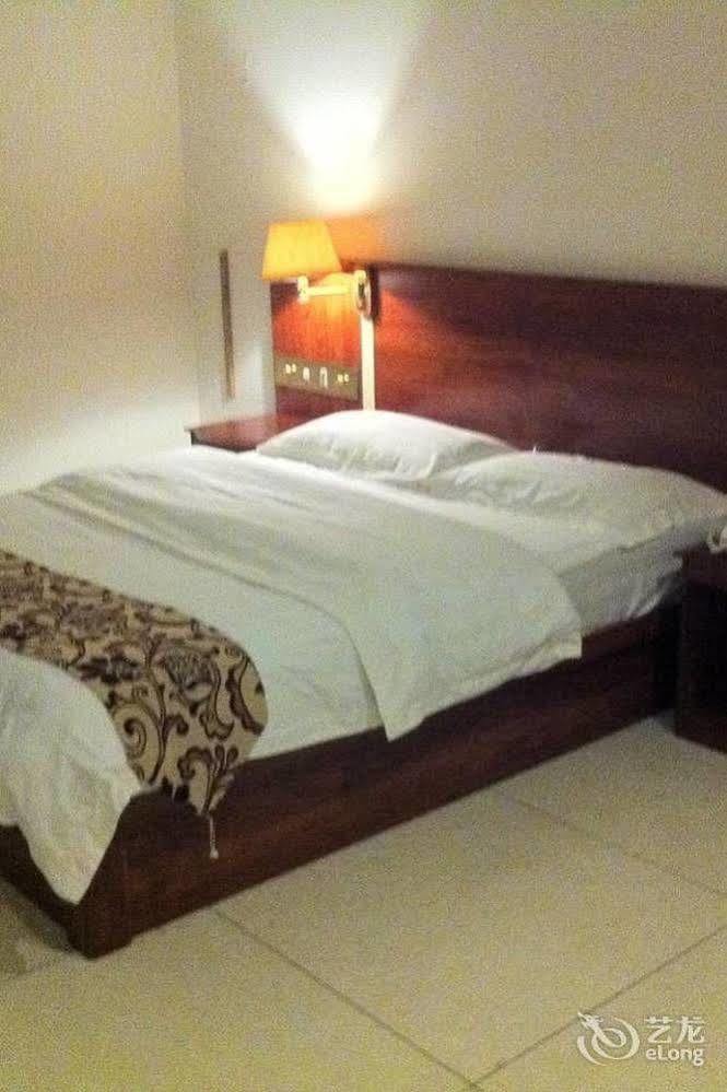 Guoxing Business Hotel Чжаоцин Екстериор снимка