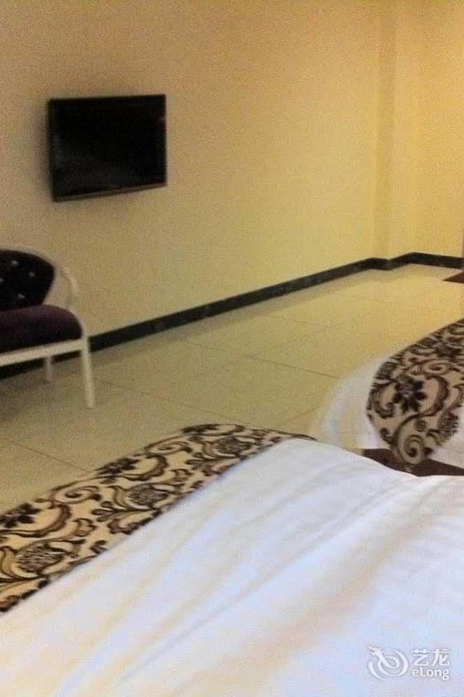 Guoxing Business Hotel Чжаоцин Екстериор снимка