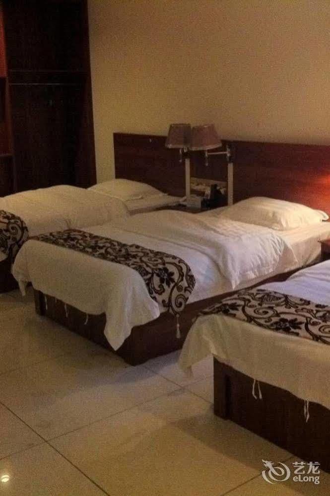 Guoxing Business Hotel Чжаоцин Екстериор снимка